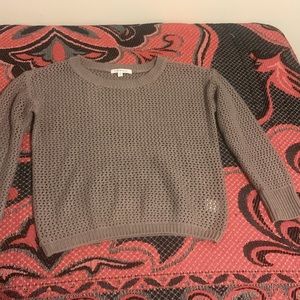 It is a size medium from the brand Purple Snow.